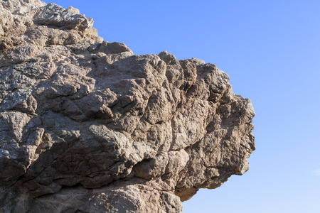 Profile face out of Rockの写真素材