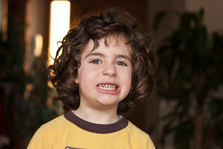 Young girl with toothy smile