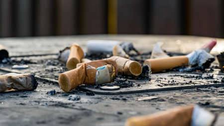 Close up of Cigarette butts discarded after smokingの写真素材