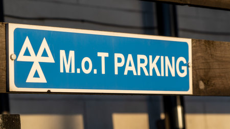 Close up of an MOT parking sign at a garageの写真素材