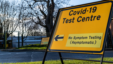 Covid-19 sign outside a walk-in test center (non-symptomatic)