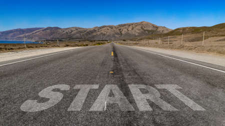 Start written on highway road to the mountainの写真素材