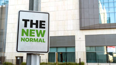 The new normal sign in a downtown city settingの写真素材