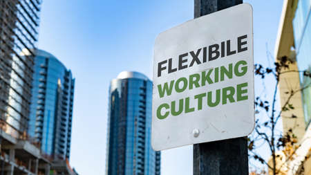 Flexible Working Culture Worn Sign in Downtown city settingの写真素材