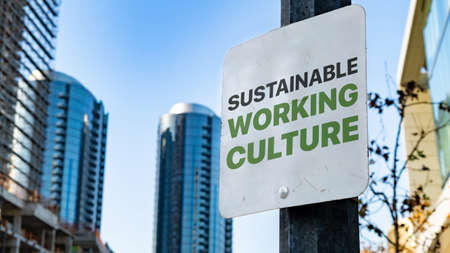 Sustainable Working Culture on Worn Sign in Downtown city settingの写真素材