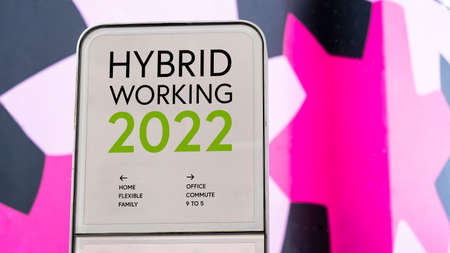 Hybrid Working 2022 with colourful city backdrop locationの写真素材