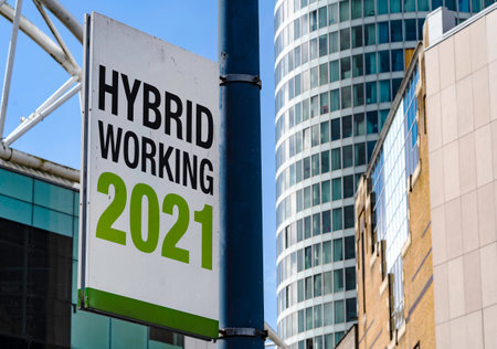 Hybrid Working 2021 sign in a downtown city centerの写真素材