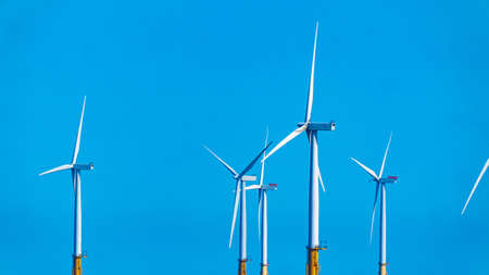 Side view of a Large Offshore wind turbines farm in the North Seaの写真素材