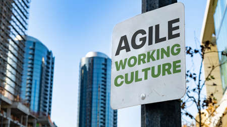 Agile Working Culture on Worn Sign in Downtown city settingの写真素材