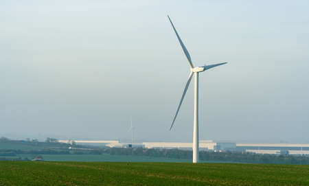 A wind turbine in the fieldの写真素材