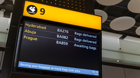 Airport flight and baggage carousel information screenの写真素材