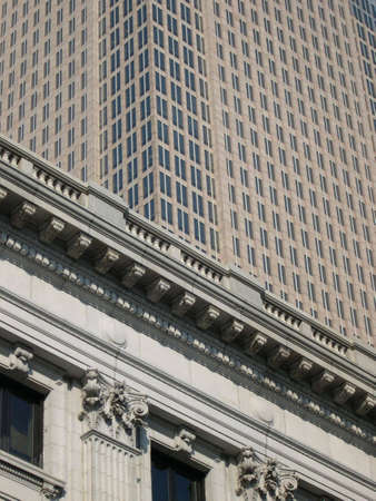 Old building with newer highrise in background.の写真素材