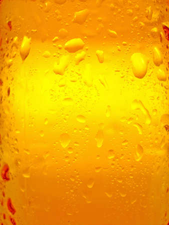 Condensation on glass.  Amber backgroundの写真素材