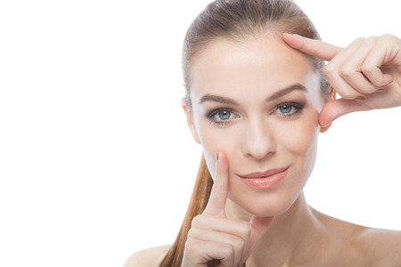 A face close-up  Beautiful young model framing her face の写真素材