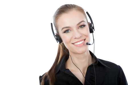A close-up portrait of a beautiful customer service worker with head set and microphone. Isolated on white. Copyspace available.
の写真素材