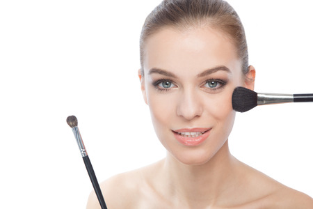 make-up process on a beautiful womenの写真素材