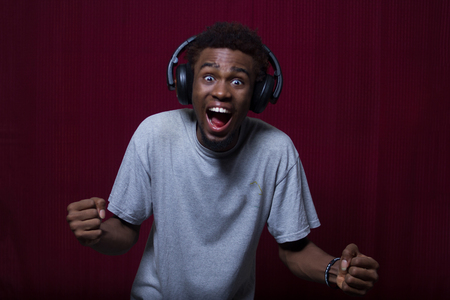 African black Screaming with headphone onの写真素材