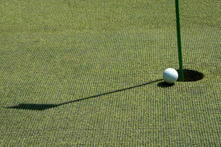 An excellent shot on a sunny day at a resort golf courseの写真素材