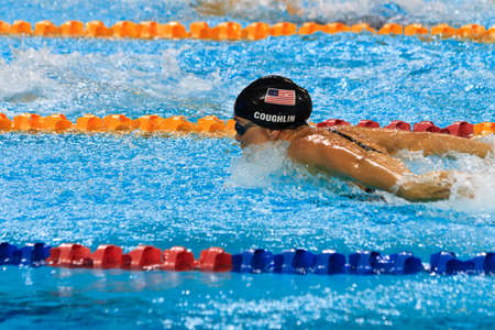 Natalie Coughlin races in the 100m butterfly finals at the FINA World Cup 2010 in Singapore. 16/10/2010のeditorial素材