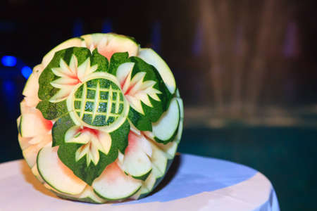 Intrinsic floral patterns are carved into watermelons and put on displayの写真素材