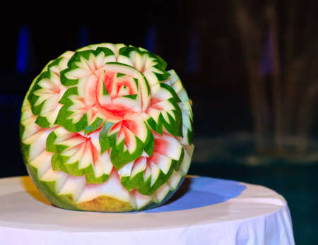 Intrinsic floral patterns are carved into watermelons and put on displayの写真素材