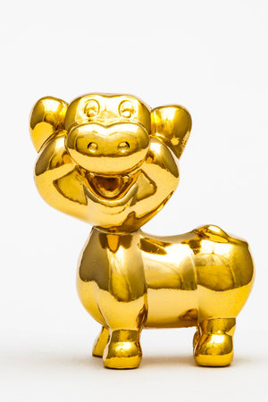 Golden figurine of the chinese zodiac sign of the pig.の写真素材