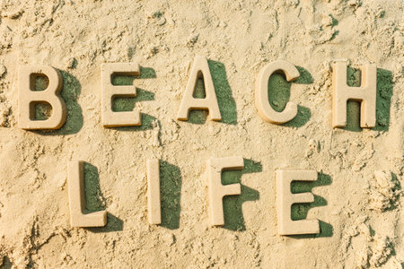 Beach life message in the sand.の写真素材