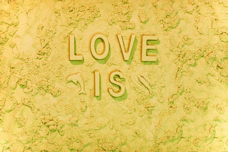 Love is the beach message in the sand.の写真素材