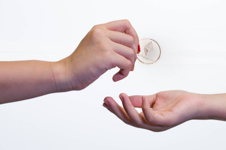 Close up of an exchange of a crypto currency coinの写真素材