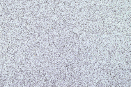 Snow white colored sand paper textured background with sparkles and glittersの写真素材
