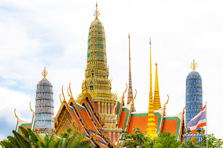 Highly ornate roof tops and spires with in Bangkok's Grand Palace complexのeditorial素材