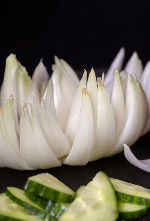 Flower from white onions. Black background, close up, small depth of sharpnessの写真素材