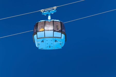 Closed cabin of the cable car lift in the ski resort.