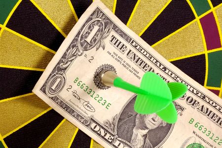Dollar Bill on a Dartboardの写真素材