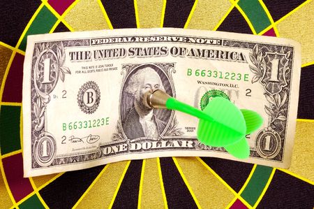 Dollar Bill on a Dartboardの写真素材