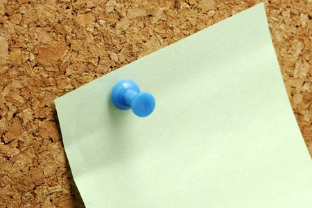 Blank Postit Note Tacked To a Corkboardの写真素材