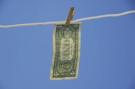 Dollar Hanging on a Clotheslineの写真素材