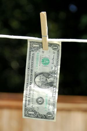 Dollar Hanging on a Clotheslineの写真素材