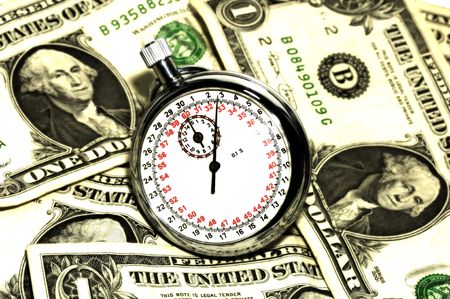 Time is Money Concept - Stopwatch and Moneyの写真素材