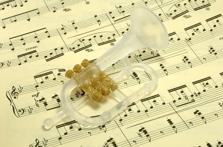 Photo of a Trumpet Ornament on SHeetmusic - Christmas Carolの写真素材