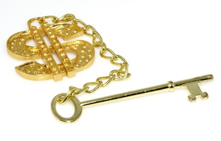 Photo of a Gold Key and Dollar Sign - Success Conceptの写真素材
