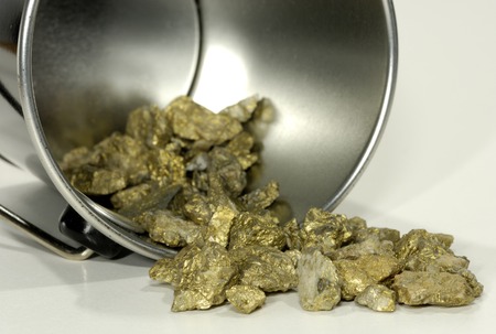 Photo of a Bucket and Gold Nuggetsの写真素材