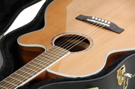 Photo of an Acoustic Guitar in a Caseの写真素材