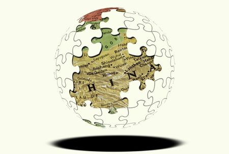 Puzzle Sphere with Map Showing THrough Missing Pieces.のeditorial素材