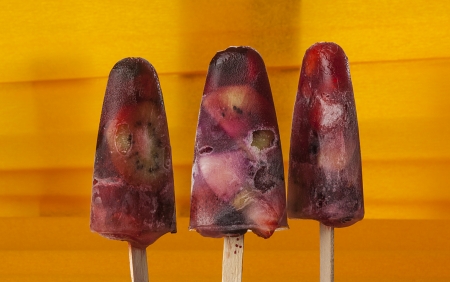 Sweet ice cream with syrup and fruits