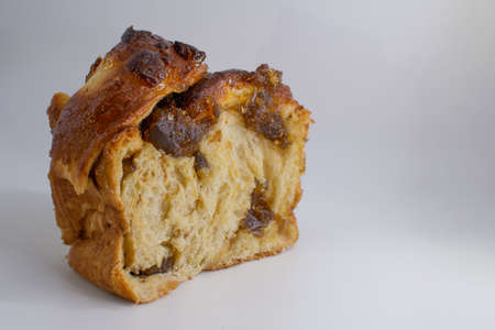Panettone is a traditional italian christmas cake on white backgroundの写真素材