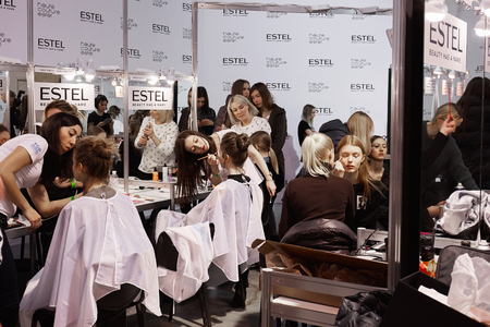 Kyiv, Ukraine - February 4, 2017: Makeup artists at work. Backstage of Ukrainian Fashion Week 2017.のeditorial素材