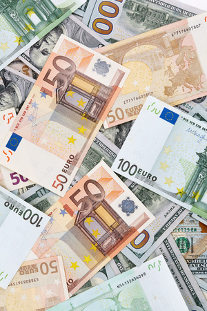 A lot of euro and american dollars banknotes. Background.の写真素材