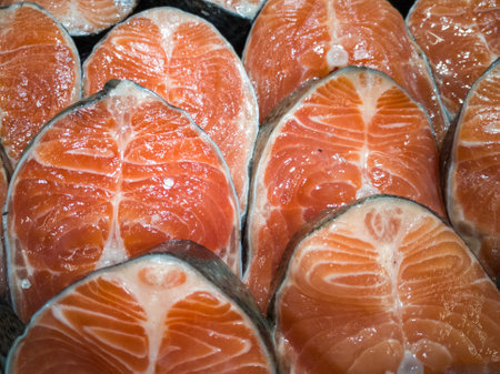 red fish salmon kumi cut close-up fish backgroundの写真素材
