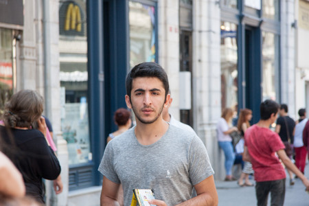 Istanbul, Turkey - July 15, 2015: Turkish man walking on Istiklal street in Central Istanbulのeditorial素材